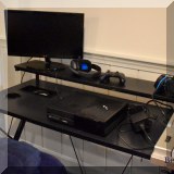 E01. Playstation and monitor. 